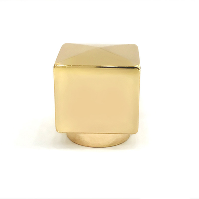 O cubo liga de zinco criativo do ouro dá forma ao metal Zamac perfuma o tampão de garrafa