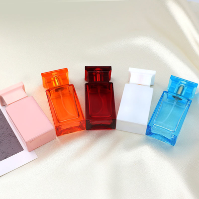 Os fabricantes perfumam por atacado garrafas, garrafas de vidro brancas altas transparentes do quadrado, empacotamento dos cosméticos