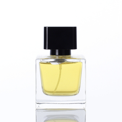 O Subpackage transparente da garrafa de vidro do perfume do quadrado por atacado de 30ml 50ml 100ml pulveriza a garrafa de perfume vazia com a tampa