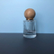 Os cosméticos de vidro portáteis da garrafa do sub do perfume da barra vertical do tampão da bola da garrafa de perfume da parte alta 30ML pulverizam a garrafa vazia da garrafa