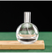Garrafa vazia do perfume secundário esférico transparente inferior grosso da baioneta do pulverizador fino da garrafa 75ml dos cosméticos